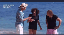 a group of men standing on a beach with the words in diretta dall ' honduras playa palapa on the bottom