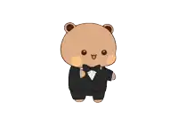 a teddy bear in a tuxedo with a bow tie
