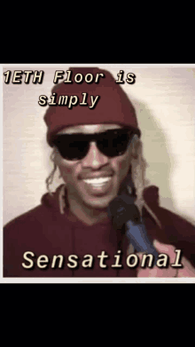 a man wearing sunglasses and a red beanie is holding a microphone with the caption " 1st floor is simply sensational "