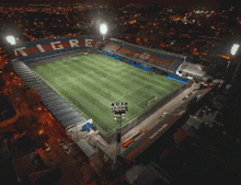 an aerial view of a soccer field with the word tigre written on the stands