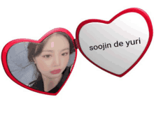 a heart shaped mirror with soojin de yuri on it