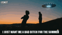 a silhouette of a man standing in front of a ufo with the caption i just want me a bad bitch