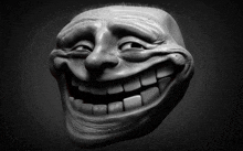 a black and white drawing of a troll face with big teeth