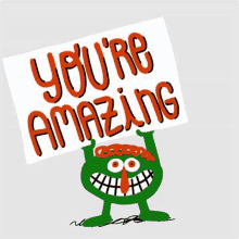 a monster is holding a sign that says `` you 're amazing '' .