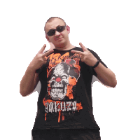 a man wearing a black t-shirt with a clown on it