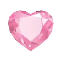a pink heart shaped jewel on a white surface
