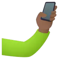 a hand in a green shirt is holding a cellphone