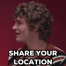 a man with curly hair is holding a brush and says share your location