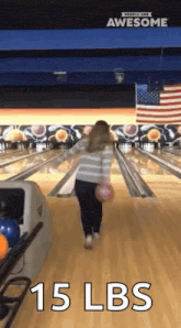 a woman is throwing a bowling ball on a bowling alley with the caption 15 lbs