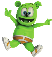 a green gummy bear wearing orange shorts and white shoes is jumping in the air