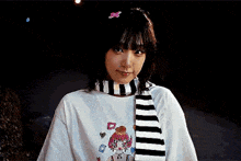 a close up of a woman 's face with a surprised expression .