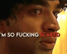 a close up of a man 's face with the words i 'm so fucking scared