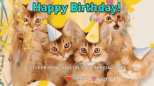 a group of kittens wearing party hats are sitting next to each other .