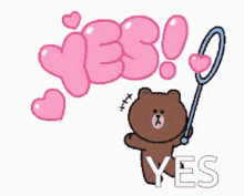 a brown bear is holding a magnifying glass with the word yes behind him