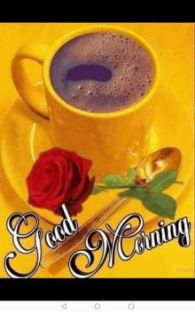 a cup of coffee and a rose on a yellow plate with the words `` good morning '' .