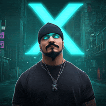 a man wearing a black shirt and a beanie stands in front of a neon x