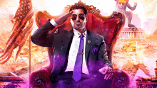 a man in a suit and tie is sitting in a chair with a saints row shirt in the background