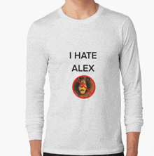 a man is wearing a long sleeve t-shirt that says i hate alex