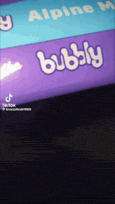 the word bubbly is on a purple and blue item