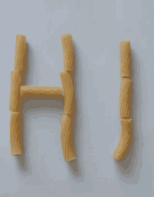 the letters h and j are made of macaroni