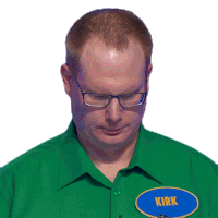 a man wearing glasses and a green shirt has a name tag that reads kirk