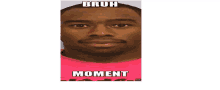 a man is wearing a pink shirt with the words bruh moment on it