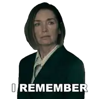 a woman in a suit with the words i remember behind her