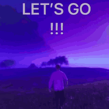 a man walking in a field with the words let 's go !!! below him