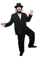 a jewish man in a suit and top hat stands on one leg