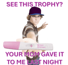 a man holding a pregnancy test with the words " see this trophy your mom gave it to me last night "