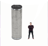 a man is standing next to a cylindrical filter