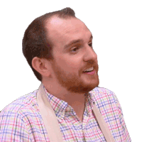 a man with a beard wearing a plaid shirt and an apron