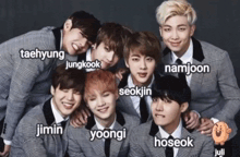 a group of young men posing for a picture with the names taehyung jungkook namjoon and jimin