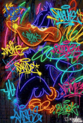 a cartoon character is surrounded by neon graffiti including one that says " looney tunes "