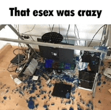 a messy computer desk with the words that esex was crazy written on it