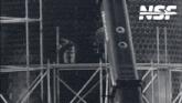 a black and white photo with the letters nss in the upper right corner