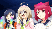 three anime girls are watching a movie and one of them is holding an ice cream cone