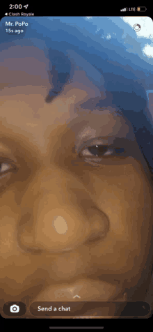 a close up of a person 's face on a phone screen