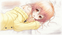 a girl with pink hair is laying down on a bed wearing a yellow sweater