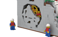 two lego figures are standing in front of a wall with a hole in it