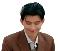 a man in a suit and tie is smiling
