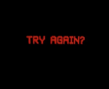 a red sign that says `` try again '' on a black background