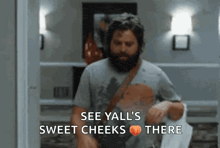 a man with a beard says see yall 's sweet cheeks