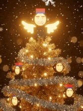 a christmas tree is decorated with monkeys and tinsel