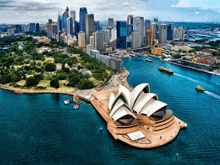 an aerial view of the sydney opera house surrounded by water