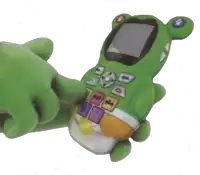 a green toy phone with a frog shaped face