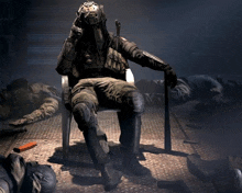 a soldier is sitting in a chair holding a bat and wearing a gas mask