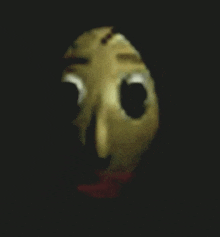 a close up of a cartoon character 's face in the dark