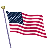 an american flag is flying in the wind on a pole