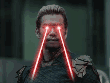 a man with two red lightsabers coming out of his eyes